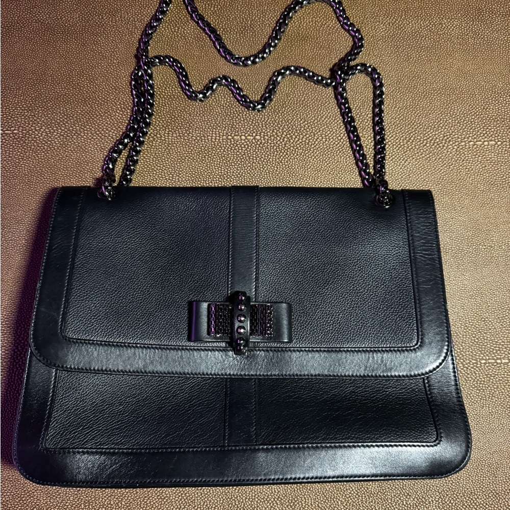 Christian Louboutin

SWEET CHARITY LEATHER CROSSBODY BAG